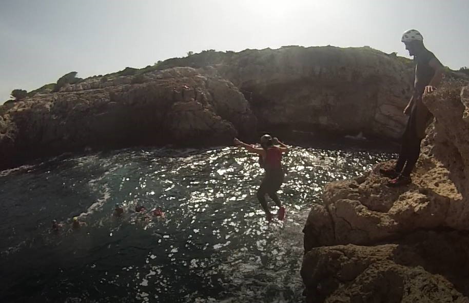 Bridget Rice Cliff Jumping into the blue water in Mallorca Spain