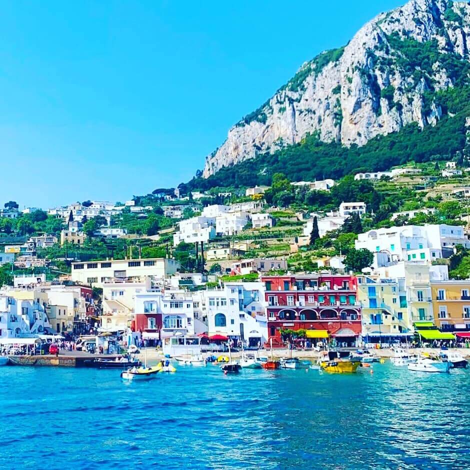 Rugged and breathtaking scenery awaits you on the island of Capri with its colorful buildings and rocky coasts.