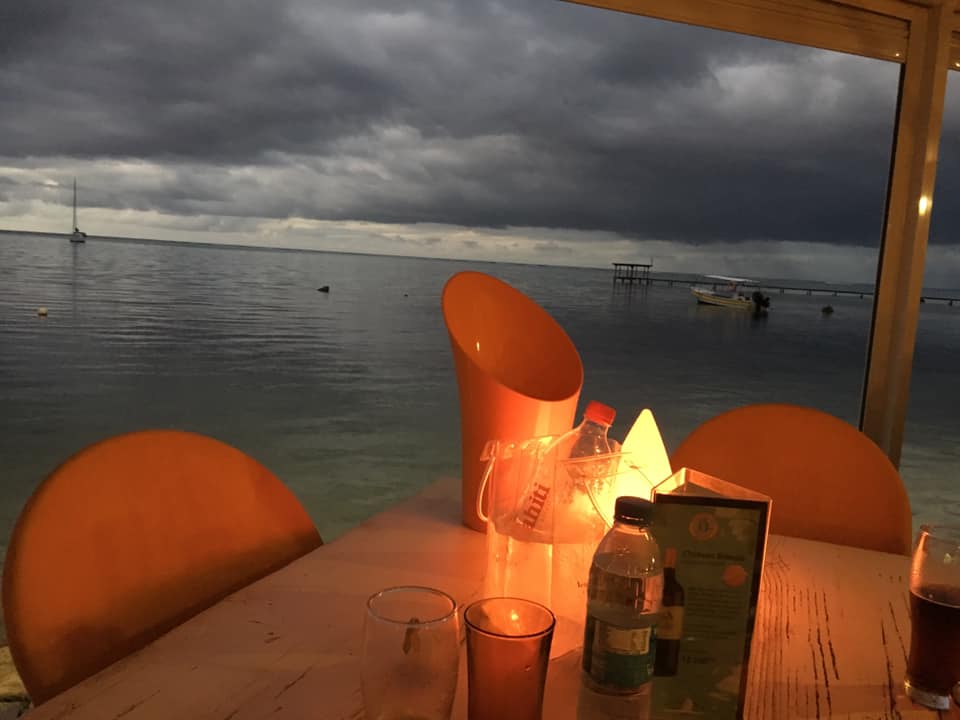 Eating dinner at Moorea Beach Cafe in Moorea, French Polynesia